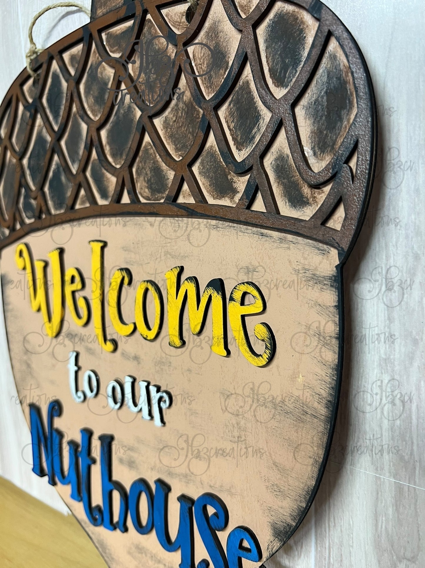Welcome to the Nuthouse Acorn-Shaped Sign Welcome Door Hanger Humorous Welcome Sign