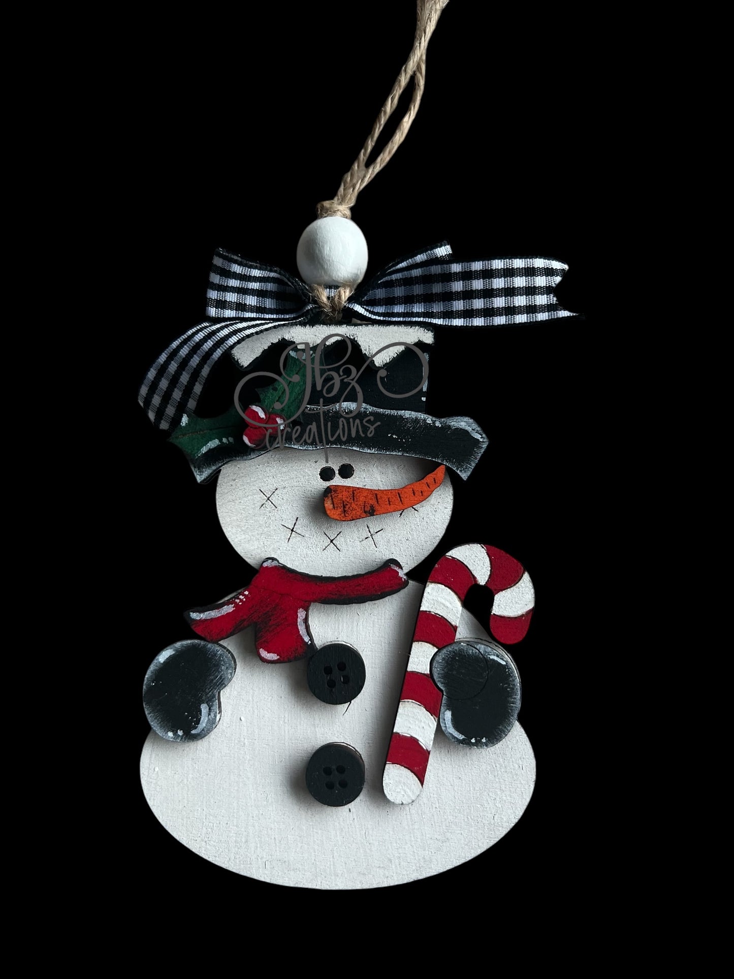 Snowman Holding a Candy Cane Christmas Tree Ornament